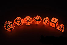 Load image into Gallery viewer, Volcanic Glow In The Dark Metal Dice